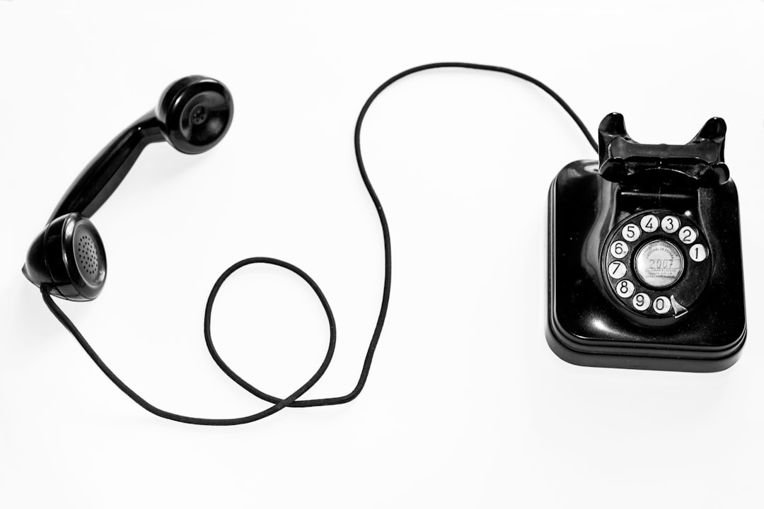 …aquellos tiempos by Phone Brands photo of black rotary phone against white background