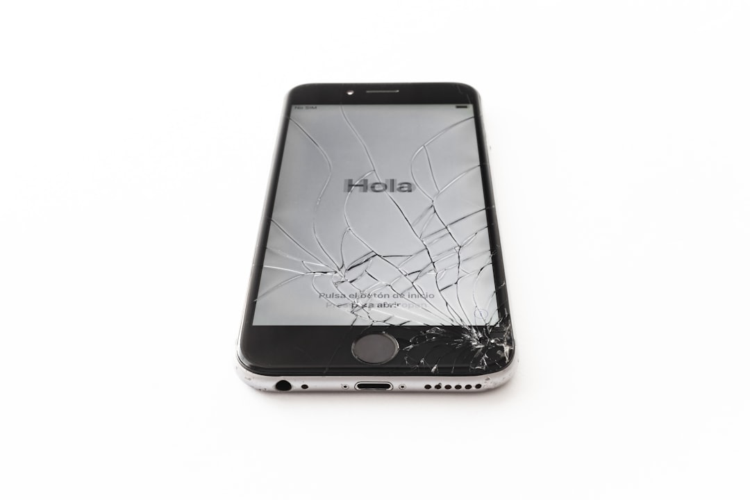 Broken iPhone glass showing greeting against white background
by Phone Brands an iphone with a cracked screen on a white surface